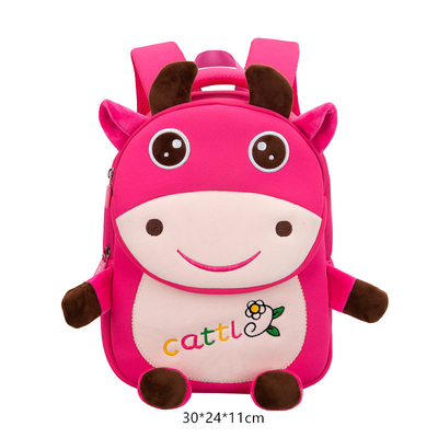 Le ragazze animali impermeabili di asilo del fumetto 3D dello zaino dei bambini della mucca adattano le cartelle